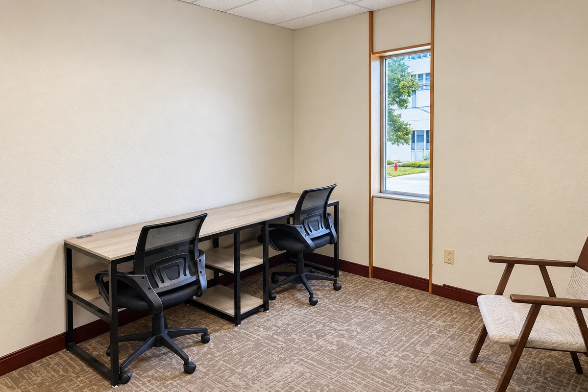 suite 203 private office interior with workspace and window